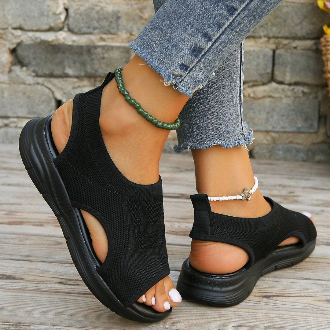 Non-slip sole of women's orthopedic walking sandals, cushioned for superior comfort & stability.