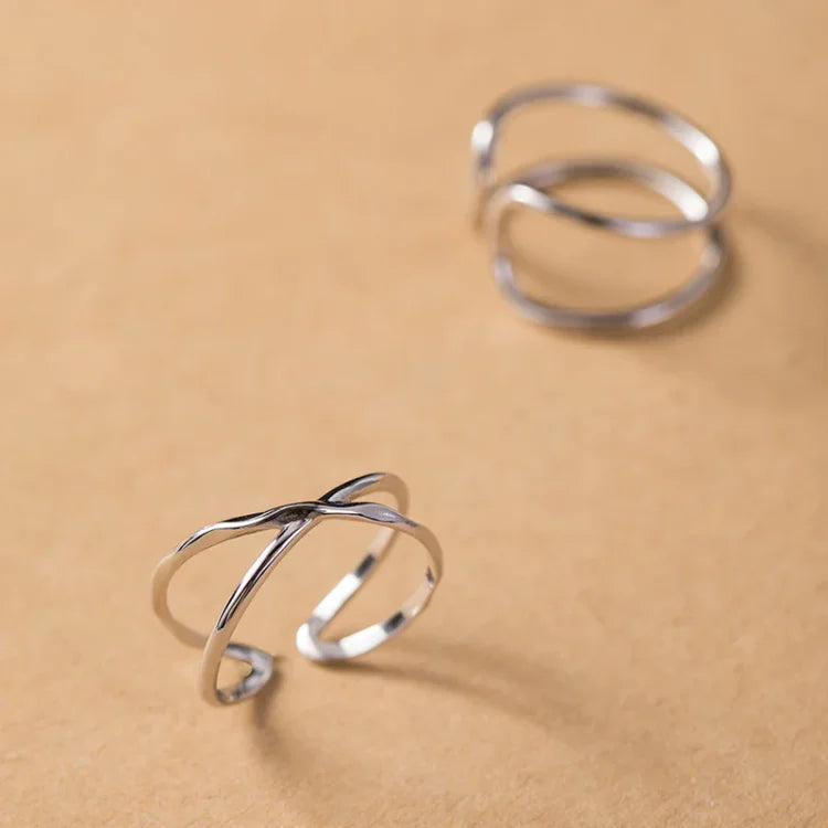 Modern adjustable women's sterling silver double line ring, hypoallergenic and comfortable for daily wear.