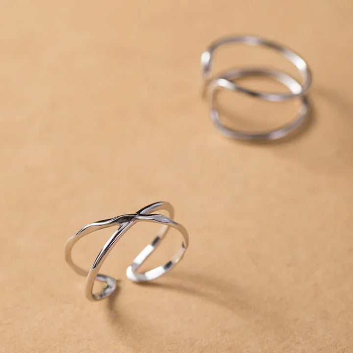 Modern adjustable women's sterling silver double line ring, hypoallergenic and comfortable for daily wear.