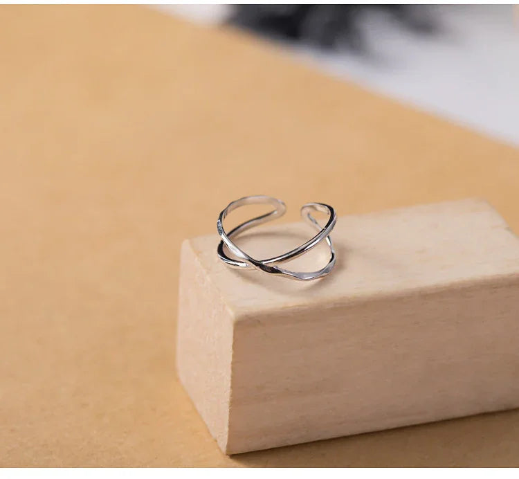 Versatile women's adjustable sterling silver double line ring, great for everyday wear or stacking.