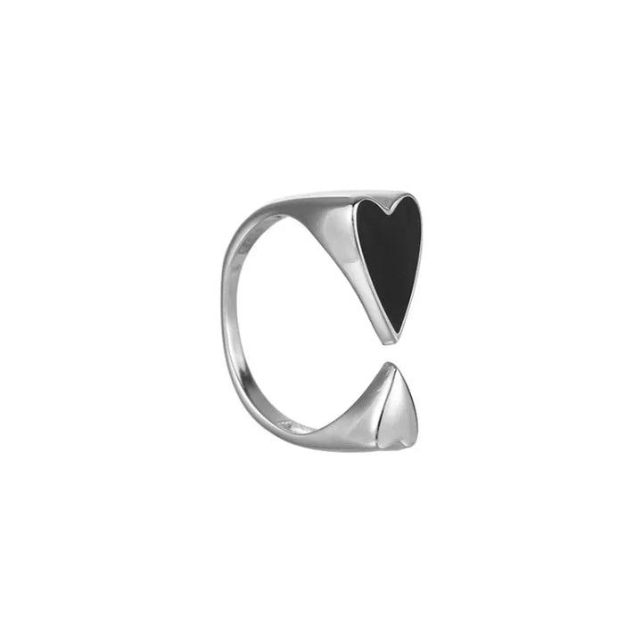 Women's adjustable sterling silver ring with a symmetrical heart design, ideal as a romantic gift.
