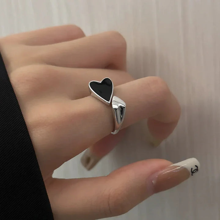 Elegant sterling silver adjustable heart ring for women, a fine jewelry piece and romantic gift.