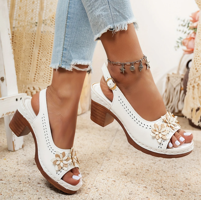 Stylish women's summer sandals with ergonomic design and adjustable straps for comfort footwear.