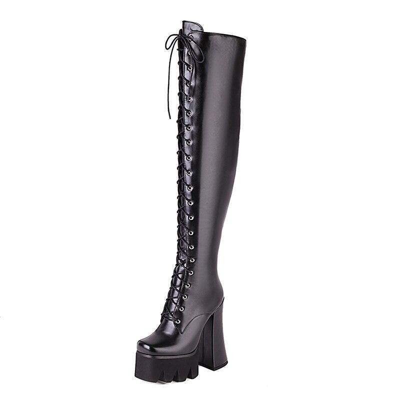Women's Adora platform knee-high boots, perfect for an edgy, fashion-forward look. High heel, sleek design.