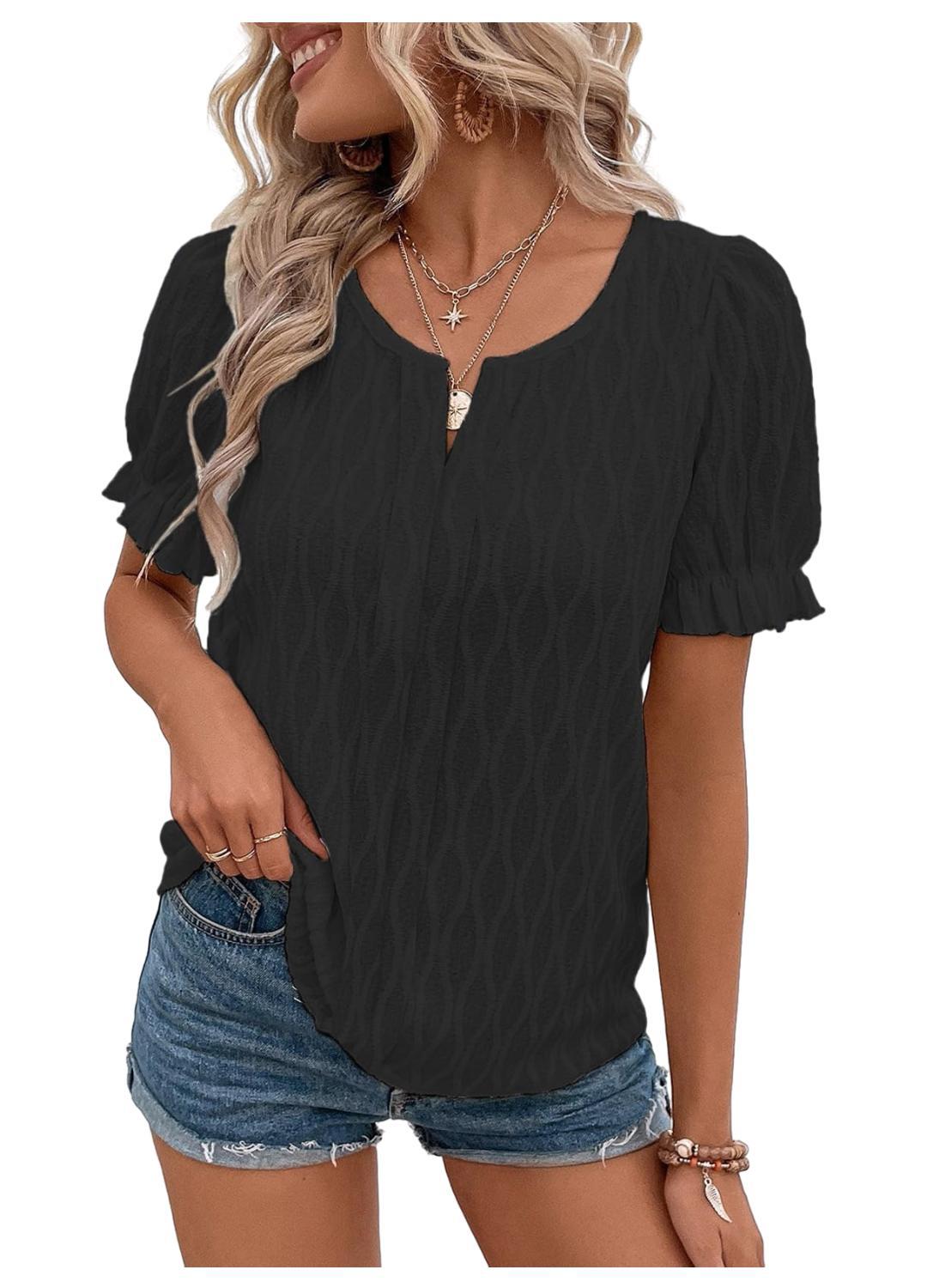 Voluminous puff sleeve detail on the women's airy blouse, a key feminine fashion element.