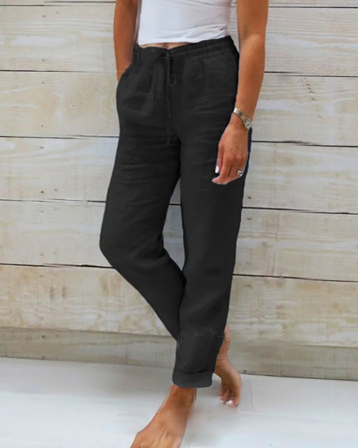 Women's warm weather pants with elastic waist, offering breezy comfort for vacation & everyday style.