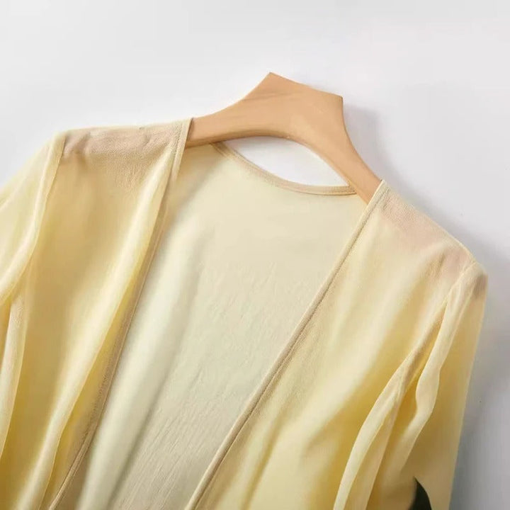 Yellow Alena lightweight cardigan, an elegant women's long sleeve cover-up, perfect for layering.