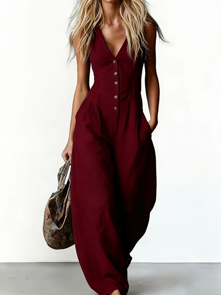 Stylish women's wide leg jumpsuit, relaxed fit, ideal for casual summer wear. Features a comfortable V-neck & pockets.