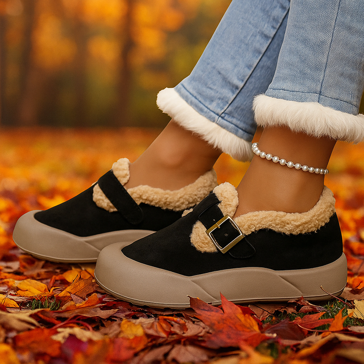 White Snow Alira buckle clogs. Comfortable women's slip-on shoes, cozy and versatile for daily wear.