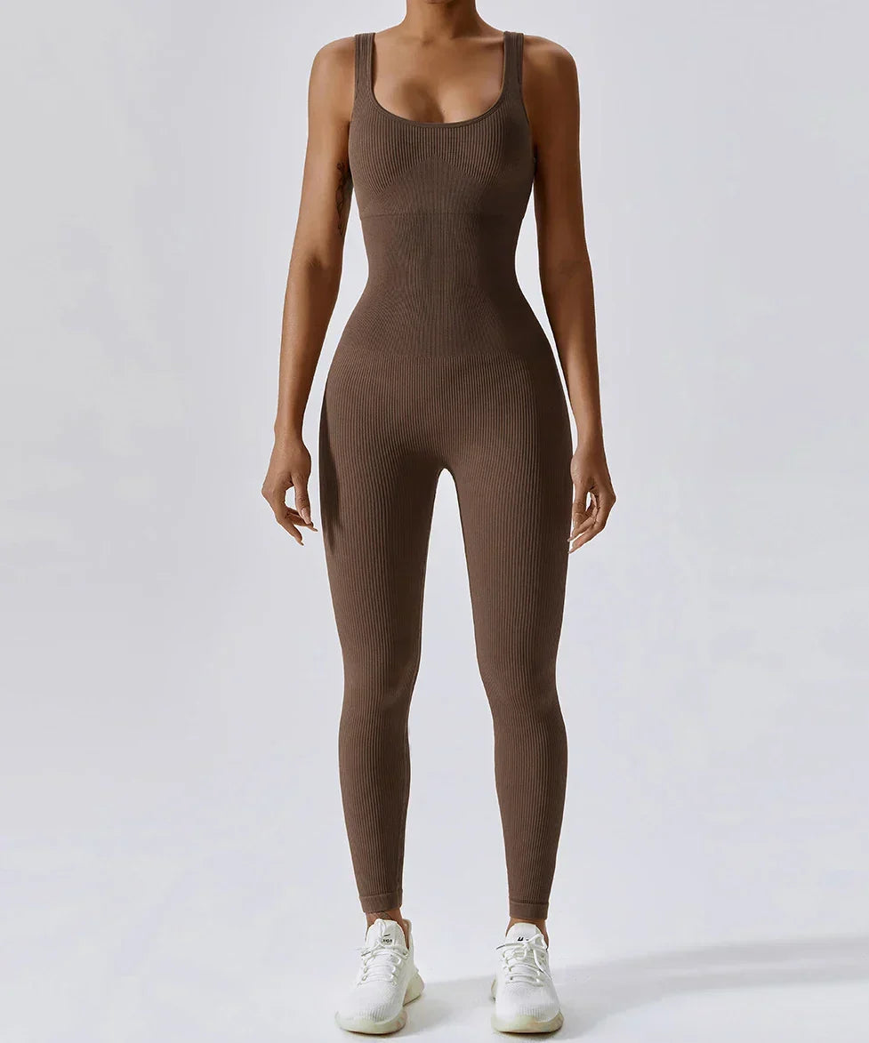 Back view: Women's versatile fitness jumpsuit by Nova. All-season athletic wear for comfortable movement.