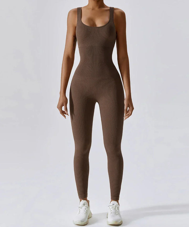 Back view: Women's versatile fitness jumpsuit by Nova. All-season athletic wear for comfortable movement.