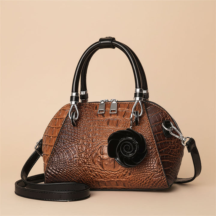 Premium women's alligator-texture faux leather bag, a chic statement accessory for evening.