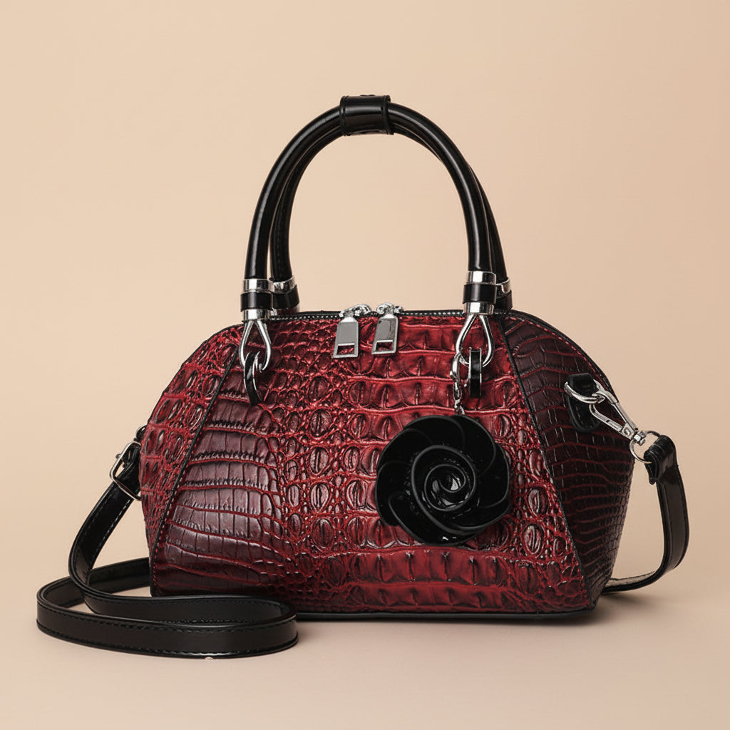 Faux leather women's handbag with intricate alligator texture, a chic and elegant statement bag.