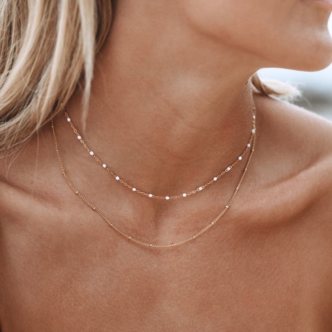Close-up of Amara double bead choker, showcasing its elegant design and adjustable fit.