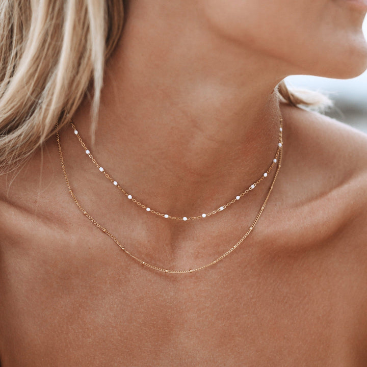 Close-up of Amara double bead choker, showcasing its elegant design and adjustable fit.
