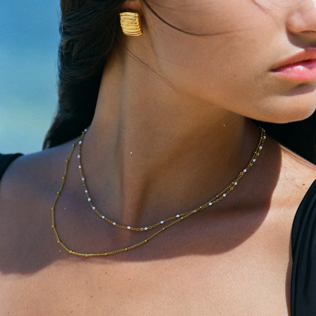 Trendy double bead Amara choker, versatile women's fashion necklace.