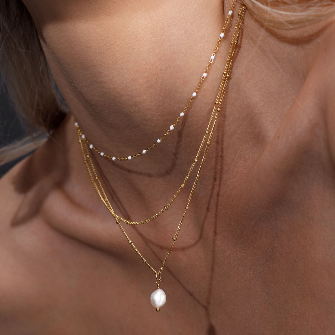 Amara double bead choker necklace, a unique women's adjustable jewelry accessory.