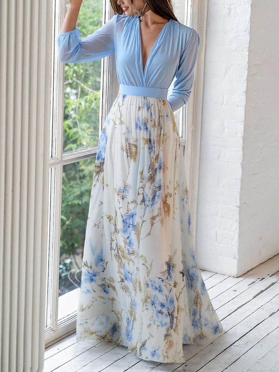 Vibrant Amara floral print maxi dress for women, featuring a comfortable flowing design and elegant V-neck.