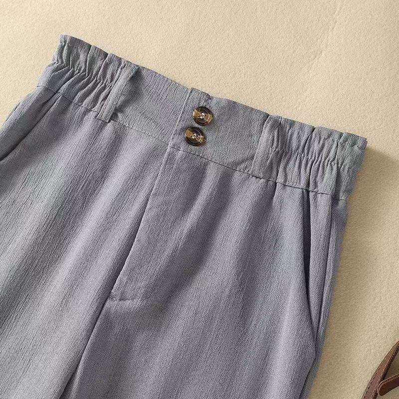 Flowy Amara high-waist wide-leg trousers for women. Versatile, comfortable, and chic for any casual or elegant look.