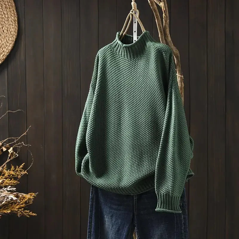 Comfortable women's relaxed fit pullover sweater in a stylish knit, ideal for everyday casual wear & warmth.