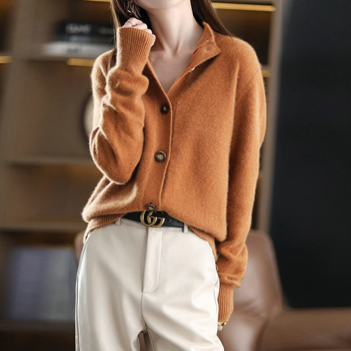 Display of Women's Amelia Button-Up Sweater in multiple colors: light brown, orange, navy, black, brown.