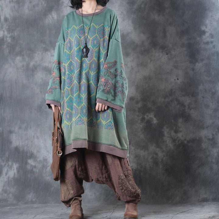 Flowing women's midi dress with an oversized O-neck, offering versatile, comfortable style for spring and fall fashion.