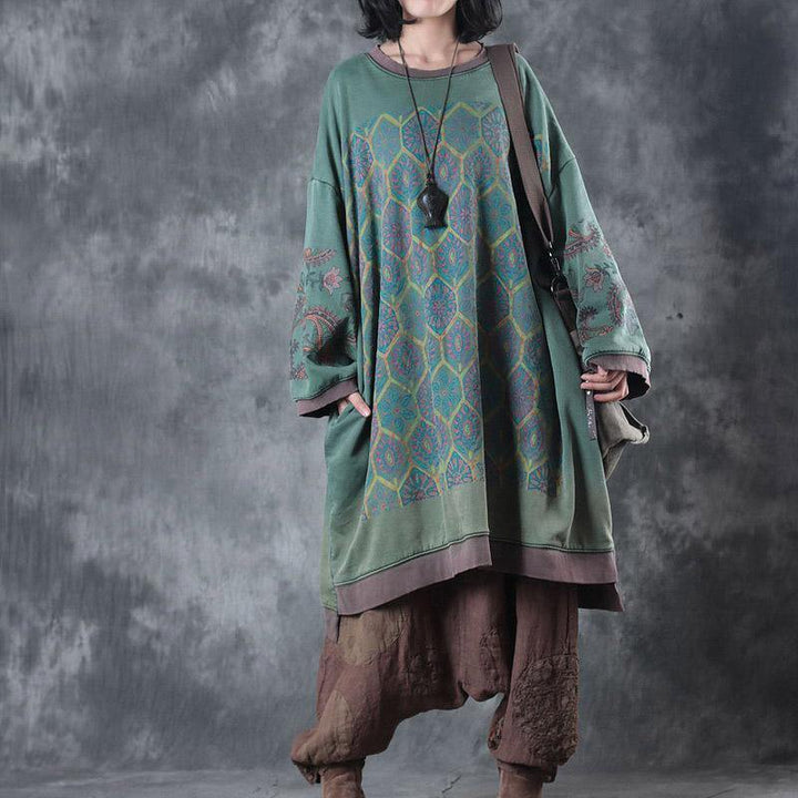 Casual women's oversized O-neck midi dress, ideal for effortless daily wear with its comfortable, loose silhouette.