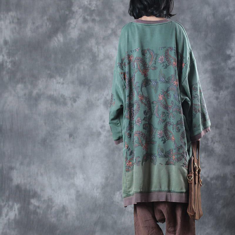 Stylish women's oversized O-neck midi dress, perfect for relaxed outings and versatile fall or spring ensembles.