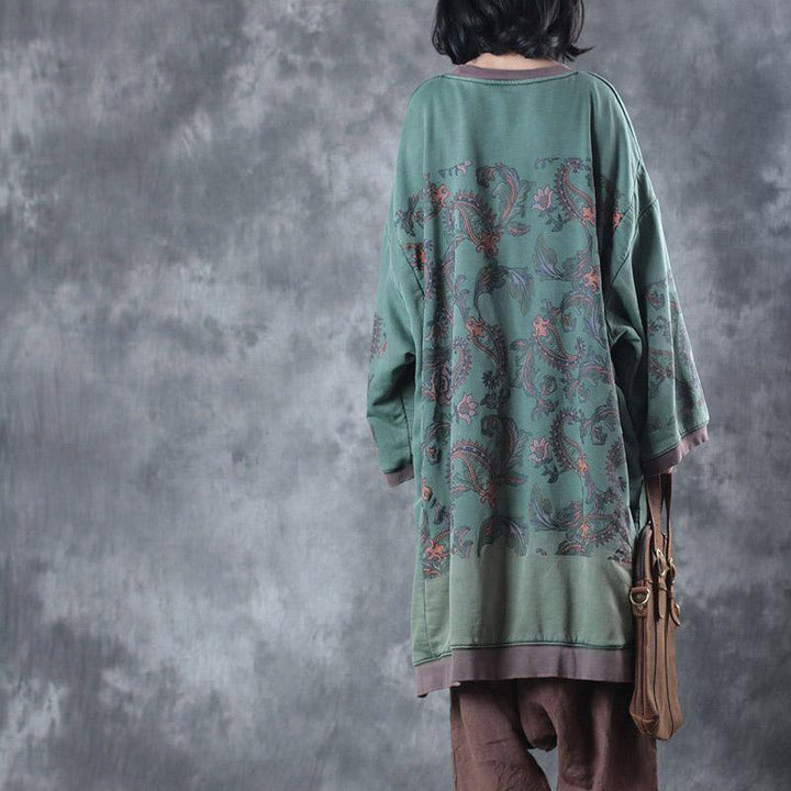 Stylish women's oversized O-neck midi dress, perfect for relaxed outings and versatile fall or spring ensembles.