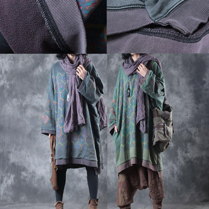 Comfortable women's oversized O-neck midi dress, designed for a flattering loose fit and everyday effortless style.