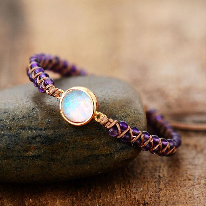Women's spiritual amethyst bracelet with healing crystals, adjustable and comfortable opal accents.