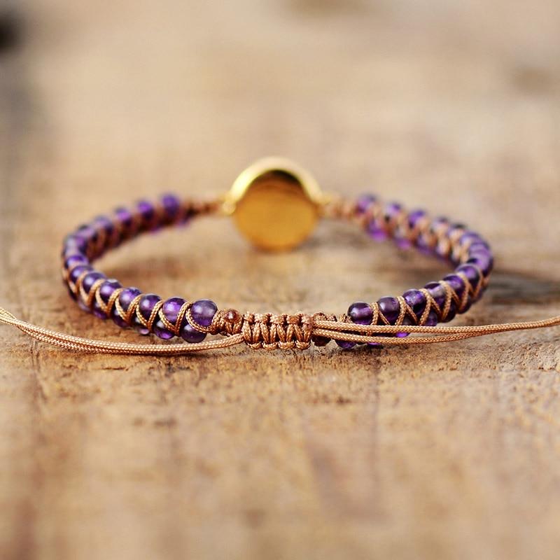 Close-up of women's Amethyst crystal healing bracelet, showcasing natural gemstone beauty and adjustable design.