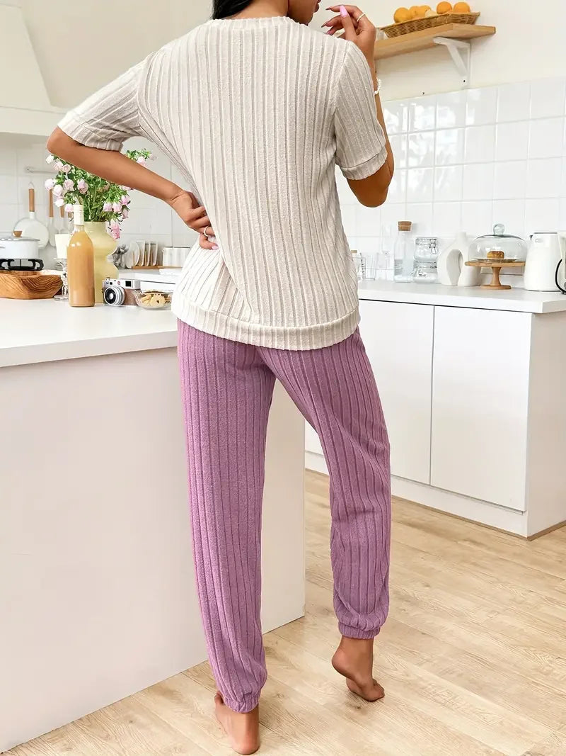 Cozy women's two-piece ribbed loungewear set featuring a sweet heart design & relaxed fit.
