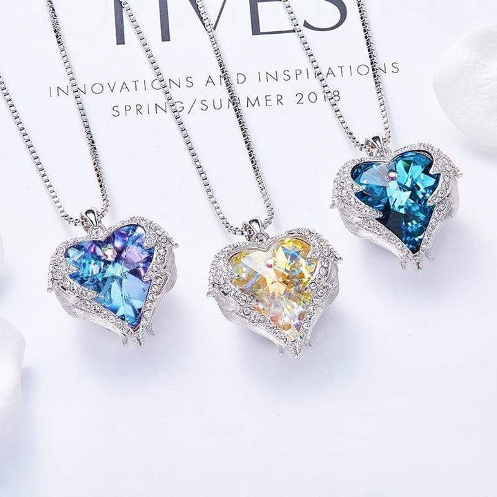 Spiritual women's angel wing heart necklace, a crystal pendant symbolizing love, protection, and a thoughtful gift.