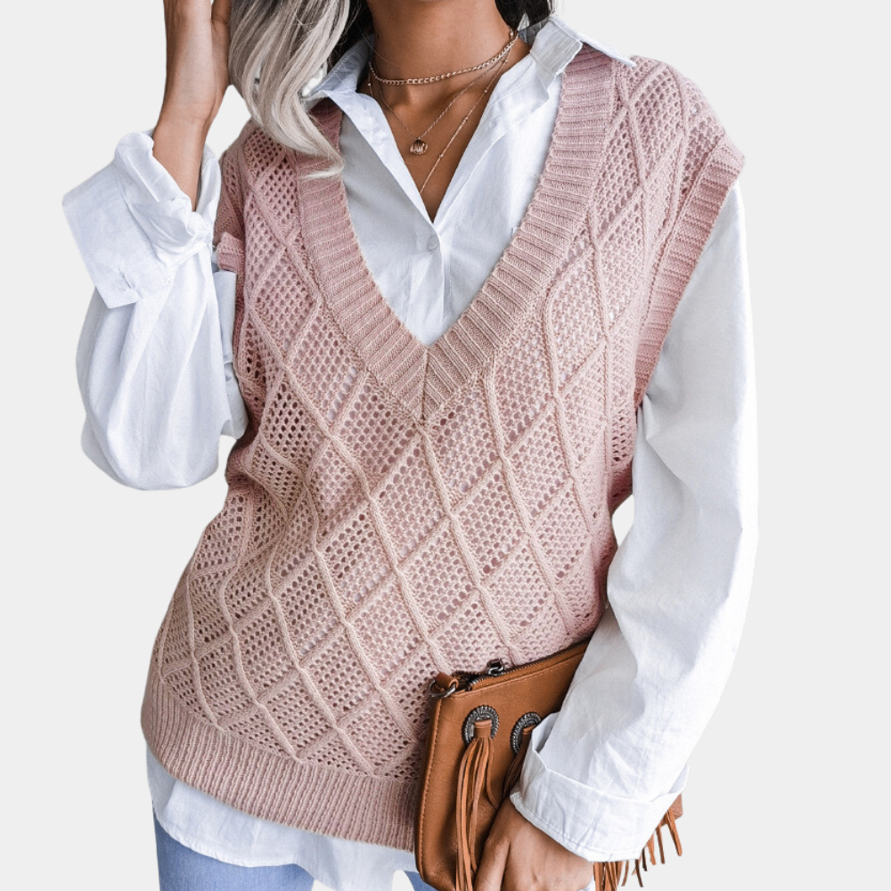Cozy pink Angeza knitted sweater for women. Trendy long-sleeve top, ideal for casual autumn and winter wear.