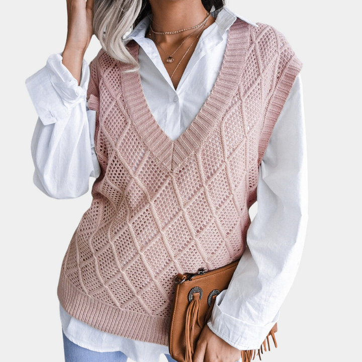 Cozy pink Angeza knitted sweater for women. Trendy long-sleeve top, ideal for casual autumn and winter wear.