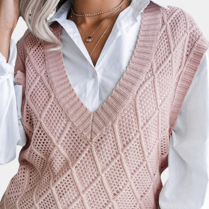 Stylish blue Angeza women's knitted sweater. Versatile long-sleeve top for everyday comfort and trendy fashion.