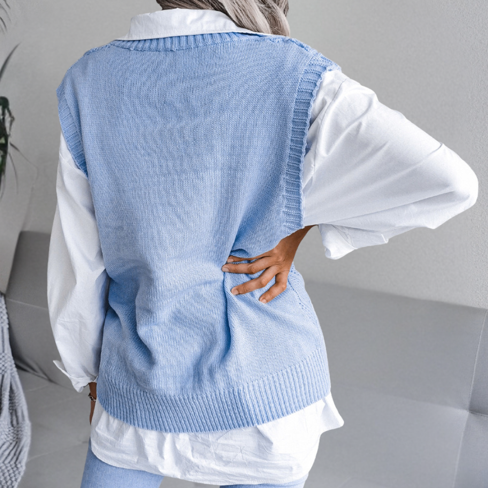 Elegant white Angeza knitted sweater, a women's winter essential. Trendy long-sleeve for effortless style & comfort.