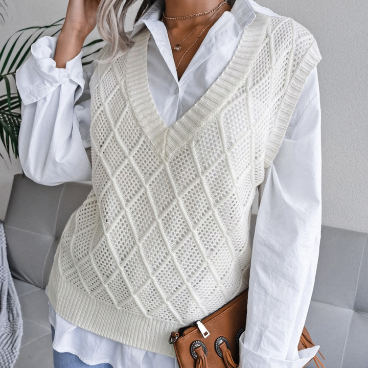Angeza women's trendy knitted sweater in pink, blue, or white. Effortless style and cozy comfort for any casual outfit.