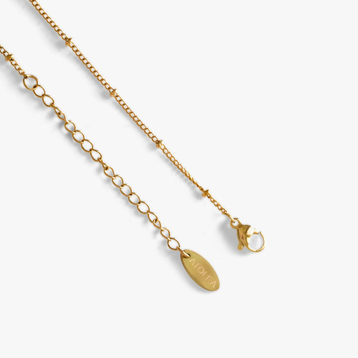Hypoallergenic silver-tone baroque pearl necklace, comfortable for sensitive skin, everyday wear.
