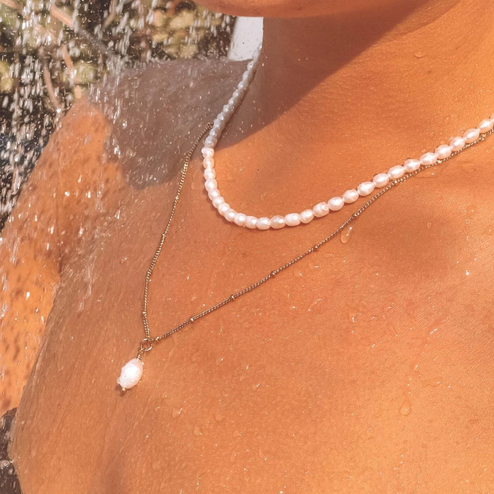 Sophisticated women's pendant necklace showcasing a unique freshwater baroque pearl.
