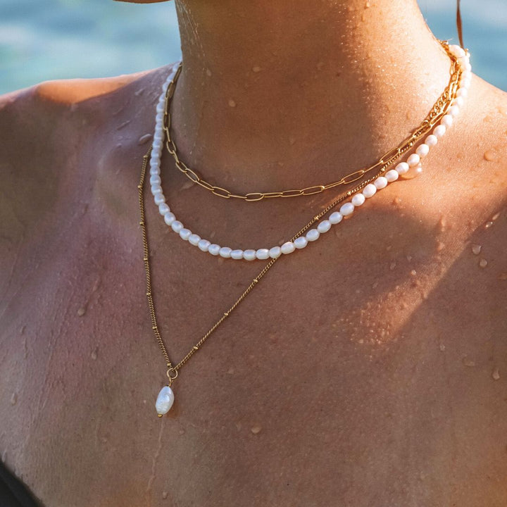 Stylish silver-tone baroque pearl necklace, perfect for everyday wear and gifts for her.