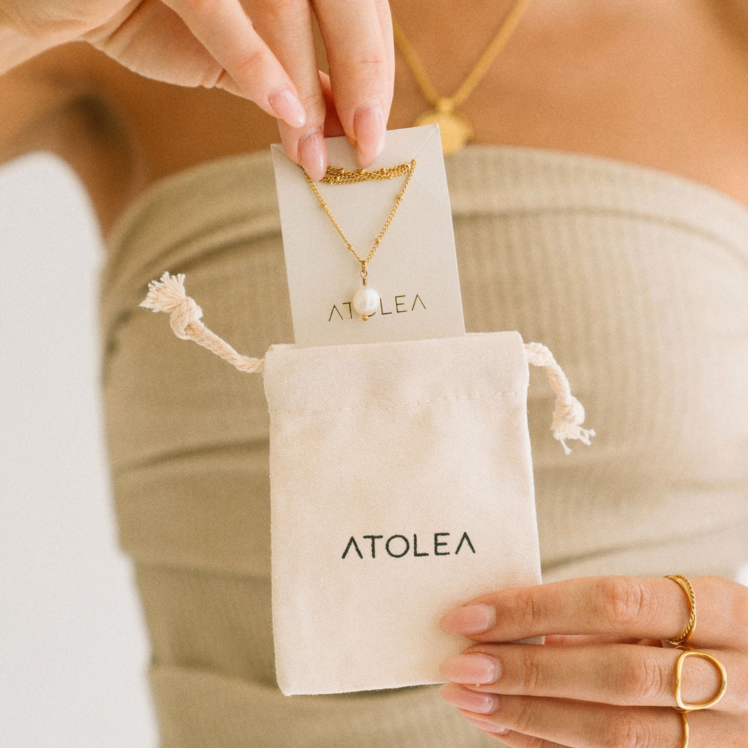 Anisa collection: Women's silver baroque pearl pendant, a timeless piece of jewelry.