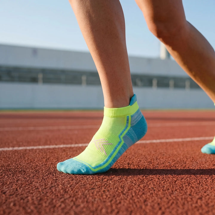 Women's ankle-length athletic socks for running and workouts. Performance activewear for fitness.
