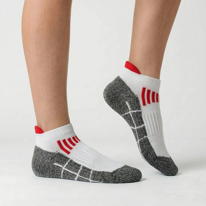 Green women's ankle-length sport socks, great for athletic workouts and fitness.