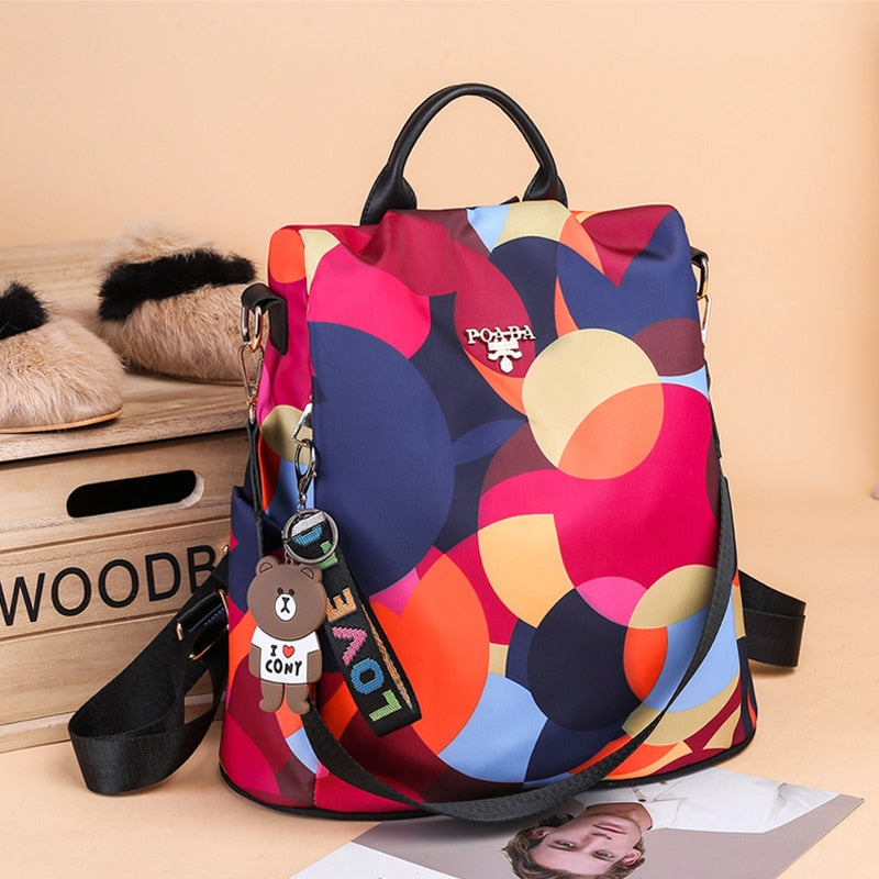 Safe & dry: Women's water-resistant anti-theft backpack, durable PU leather, multi-pocket travel bag.