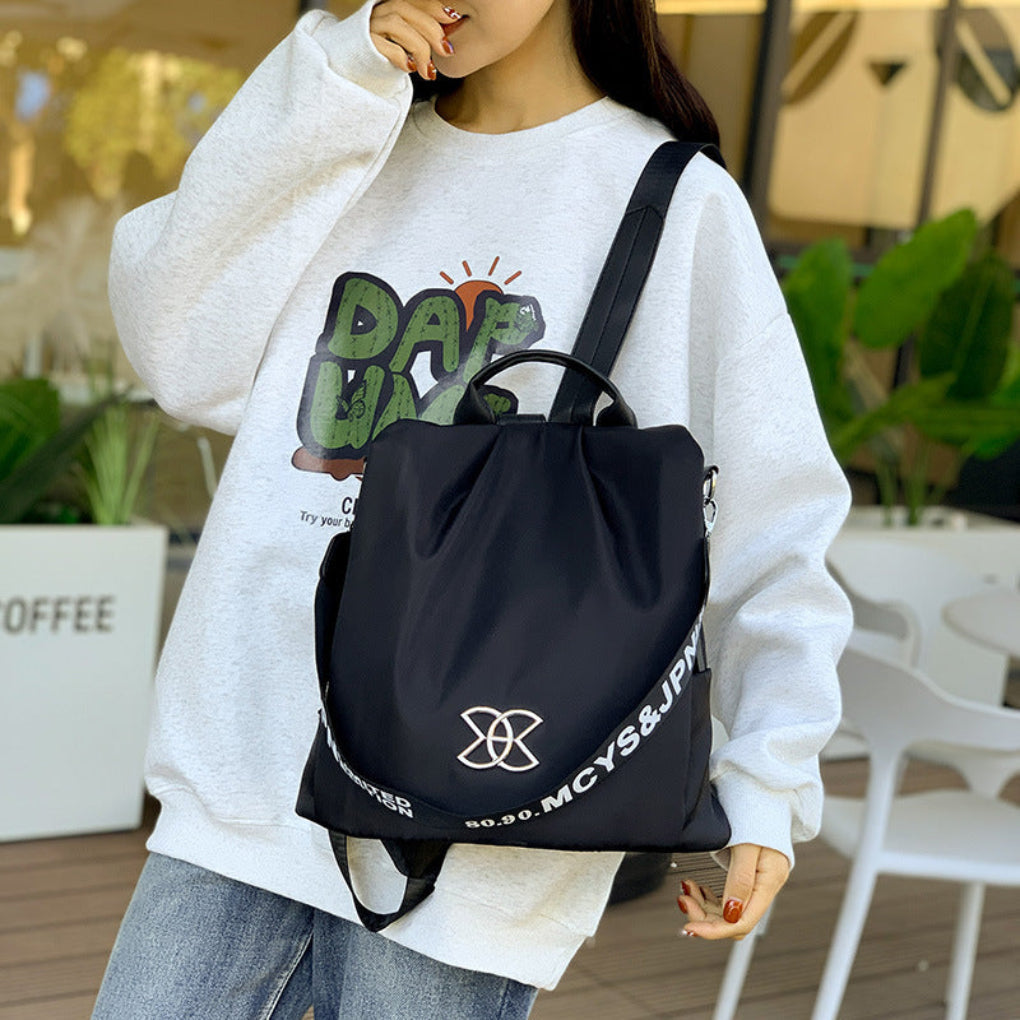 Women's anti-theft convertible backpack, sleek for daily use or travel. Secure zippers & stylish urban design.