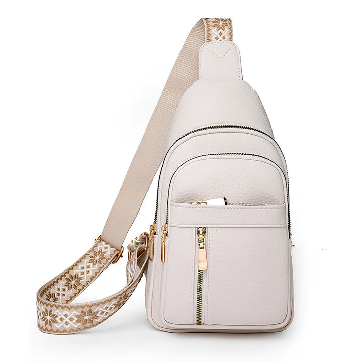 Stylish women's anti-theft crossbody sling bag with a decorative strap, ideal for secure travel & daily use.