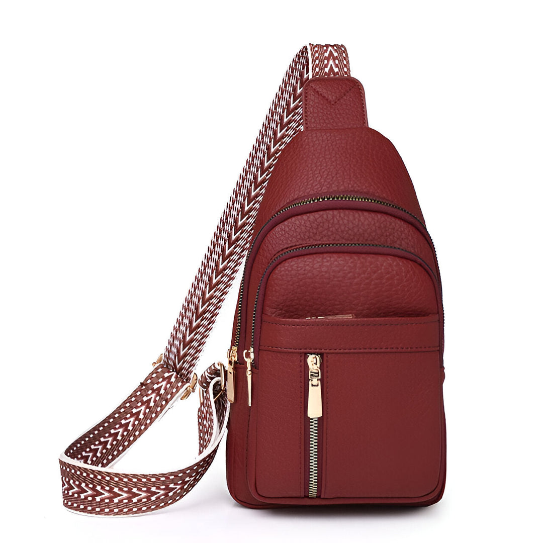 Versatile women's anti-theft sling daypack with decorative strap, functioning as a stylish travel & crossbody bag.