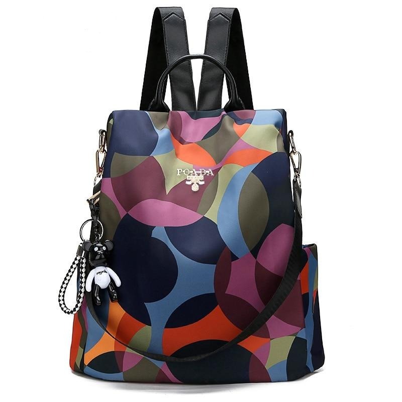 Women's anti-theft water-resistant backpack, perfect for daily travel & secure commuting.